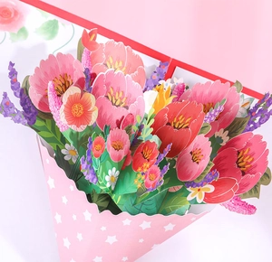 Detailed close-up of a 3D pop-up greeting card featuring a colorful paper flower bouquet