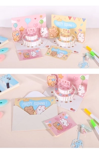 Detailed view of 3D bear birthday cards with popup cake and customizable age numbers