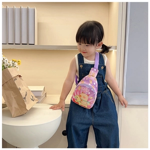Close-up of a child wearing a purple Capybara chest bag with adjustable strap and zipper