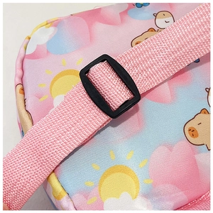 Detail of pink Capybara print fabric with adjustable woven shoulder strap and buckle