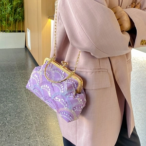 Elegant purple sequin handbag with gold chain strap for party and evening events