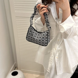 Black and white checkered tote bag with 3D bows and a stylish ruched cloud handle