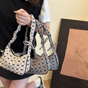 Chic quilted hobo bag with ribbon bow and gathered cloud strap in various patterns