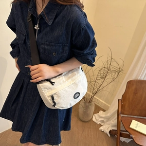 White nylon crossbody tote bag with adjustable black strap and Lucky Fashion logo