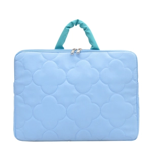 Quilted blue 11 inch iPad Pro and 14 inch laptop sleeve with floral embossed texture
