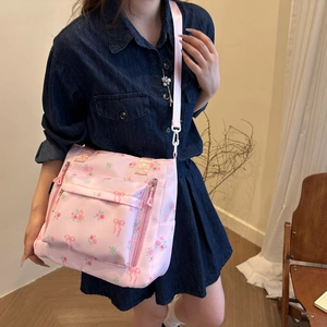 Pink floral tote bag with rose patterns and adjustable shoulder strap for women