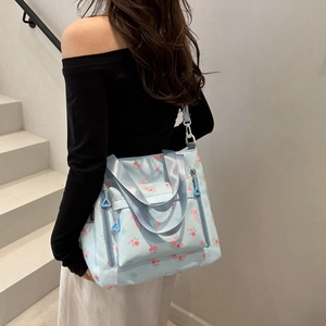 Floral large capacity tote bag with blue rose pattern and dual shoulder straps