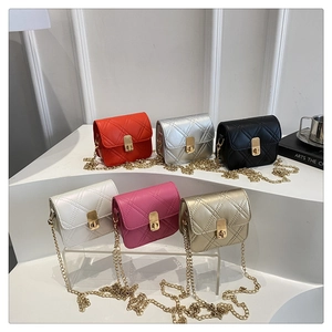 Selection of mini quilted chain bags in red, silver, black, pink, and gold