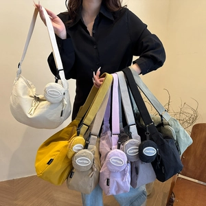 Bolsos media luna de lona estilo japonés en siete colores con mini monederos redondos