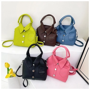 Detail shot of five shirt-shaped handbags in vibrant colors with lychee texture leather