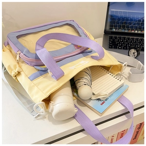 Detail view of large capacity ita bag with transparent PVC window and interior storage