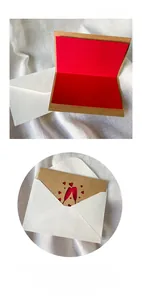 Detail of kraft thank you card with red heart cutout and matching white envelope