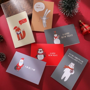 Christmas greeting cards set featuring cartoon characters wearing masks with envelopes