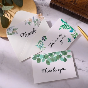 Minimalist botanical thank you cards set with gold foil accents and matching white envelopes