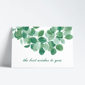 Detail of greeting card with watercolor eucalyptus leaves and the best wishes to you text