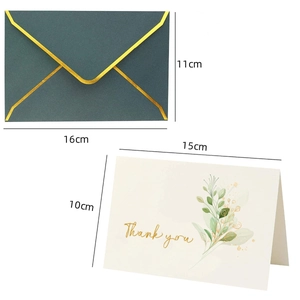 Detail of dark green gold-foiled envelope and watercolor floral thank you card with sizes