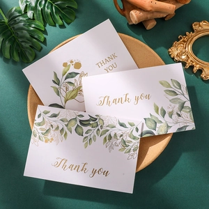 Elegant watercolor floral thank you cards with gold foil lettering on white background
