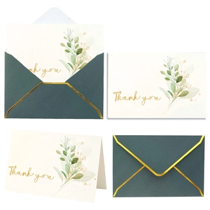 Green floral thank you cards with gold foil text and deep green envelopes set