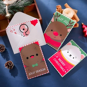 6-pack of cartoon Christmas cards with envelopes featuring reindeer and polar bear designs