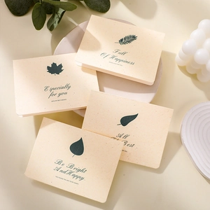 Set of four vintage greeting cards with green botanical prints and gold-stamped sentiments