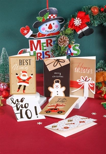 Detail view of 6 creative Christmas greeting cards with festive designs and white envelopes