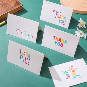 Set of 8 colorful minimalist folding Thank You cards with diverse fonts and white envelopes