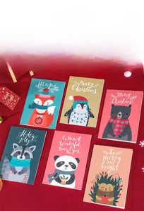 Close-up of 6 Christmas cards featuring cute cartoon animals like foxes and penguins