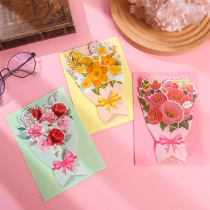 Detailed view of 3D pop-up floral greeting cards with colorful bouquets and envelopes