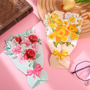 Detailed view of 3D pop-up floral greeting cards with rose and yellow flower designs