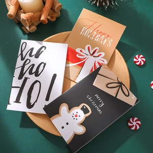 Set of 6 assorted creative Christmas cards with envelopes and stickers in festive layout