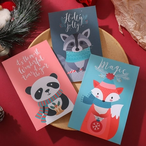 Set of 6 Christmas cards with cute cartoon animals and envelopes on festive red background