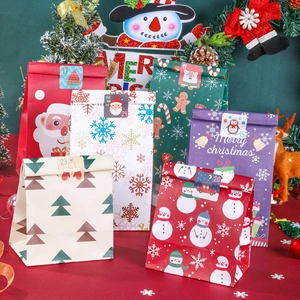 24-piece Christmas kraft paper gift bags with festive patterns and countdown stickers