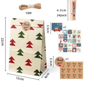 24-piece Christmas kraft paper gift bags set with festive patterns, rope, and clips