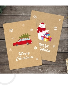 Macro detail of kraft paper Christmas cards with festive bear and car illustrations