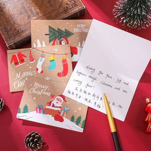 24-piece Christmas card set with cartoon designs and envelopes on a festive red background