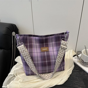 Purple checkered canvas tote bag with adjustable wide geometric patterned shoulder strap