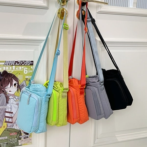 Multi-color nylon crossbody bags in blue, green, orange, gray and black with straps