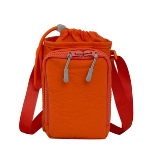 Bright orange waterproof nylon crossbody bag with drawstring closure and front zipper pocket