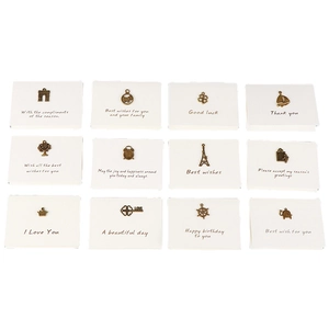 12er Set Vintage Bronze Anhänger auf Grußkarten mit Eiffelturm und Kleeblatt Motiven