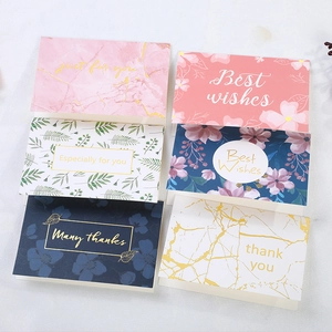 Detailed set of six diverse floral and marble greeting cards with gold foil lettering