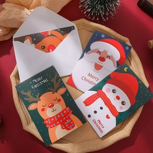 Christmas greeting card set with Santa, reindeer and snowman designs and white envelopes
