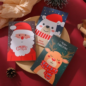 Three premium Merry Christmas greeting cards featuring Santa, polar bear, and reindeer designs
