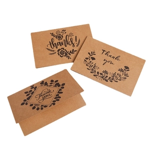Vintage kraft paper thank you cards set with floral designs and envelopes on white background