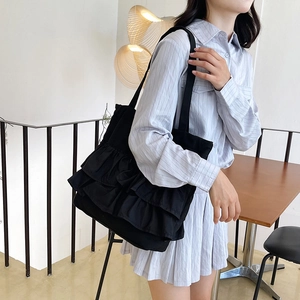 Large capacity black pleated canvas tote bag with ruffles for casual shoulder carry