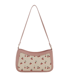 Pink cherry print baguette shoulder bag with adjustable strap and cream base
