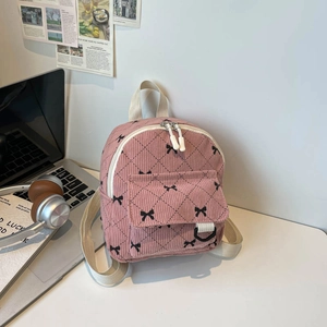 Pink corduroy mini backpack with bow print and quilted texture for women and students