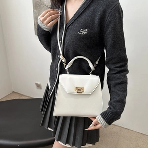 Minimalist white trapezoid PU leather crossbody bag with top handle and gold clasp