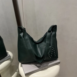 Minimalist large dark green faux leather tote bag with silver rivet M detail and wide strap