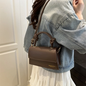 Dark brown leather square shoulder bag with knot handle and adjustable strap