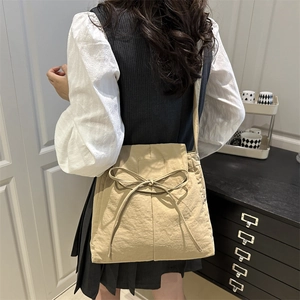 Chic khaki shoulder bag with bow decoration and stylish pleated texture for women